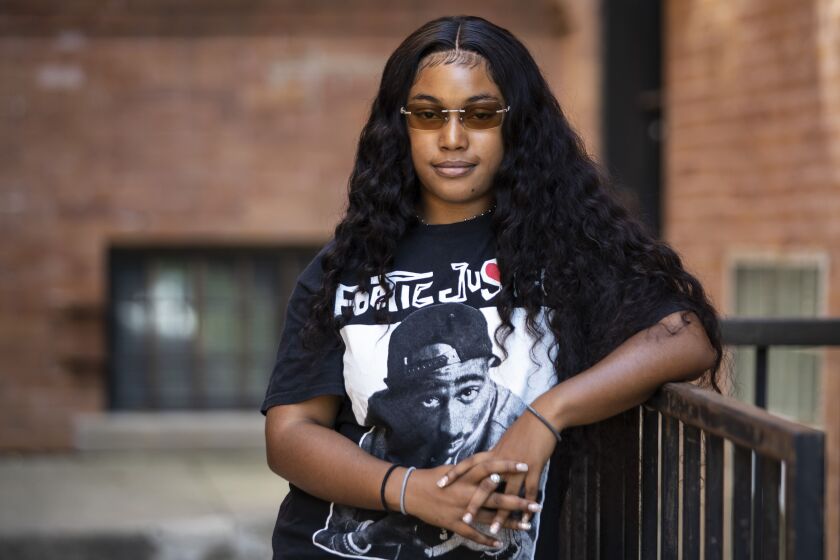 Nisa Perez, 17, outside her Washington Park home.