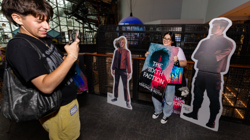 Fellow book enthusiasts Eddie Crespo, 23 years old from Chicago with Abby Plata, 23 years old of the west suburbs during “A Celebration of The Sixth Faction” at Navy Pier in Chicago, IL on Wednesday, August 12, 2026.
