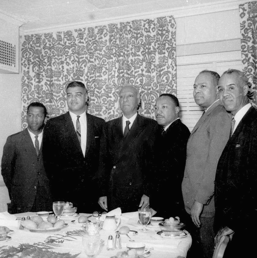 John Lewis (far left) in 1963. Lewis was at the time chairman Student Non-Violence Coordinating Committee. With him are (from left); Whitney Young, national director, Urban League; A. Philip Randolph, president of the Negro American Labor Council; Martin Luther King Jr., president Southern Christian Leadership Conference; James Farmer, Congress of Racial Equality director; and Roy Wilkins, executive secretary, National Association for the Advancement of Colored People.