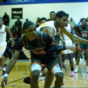 Morgan Park’s Marcus Watson Jr. (22) and Simeon’s Andre Casey Jr. (23) race to the ball, Thursday 01-24-19. Worsom Robinson/For Sun-Times