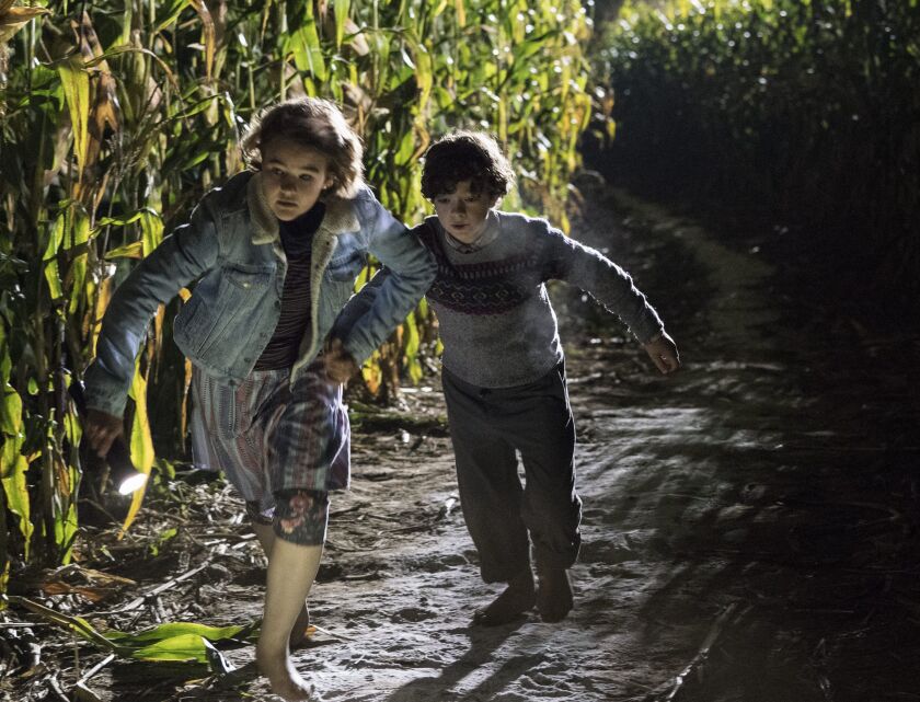 Millicent Simmonds plays a girl protecting her little brother (Noah Jupe) in “A Quiet Place.” | PARAMOUNT PICTURES