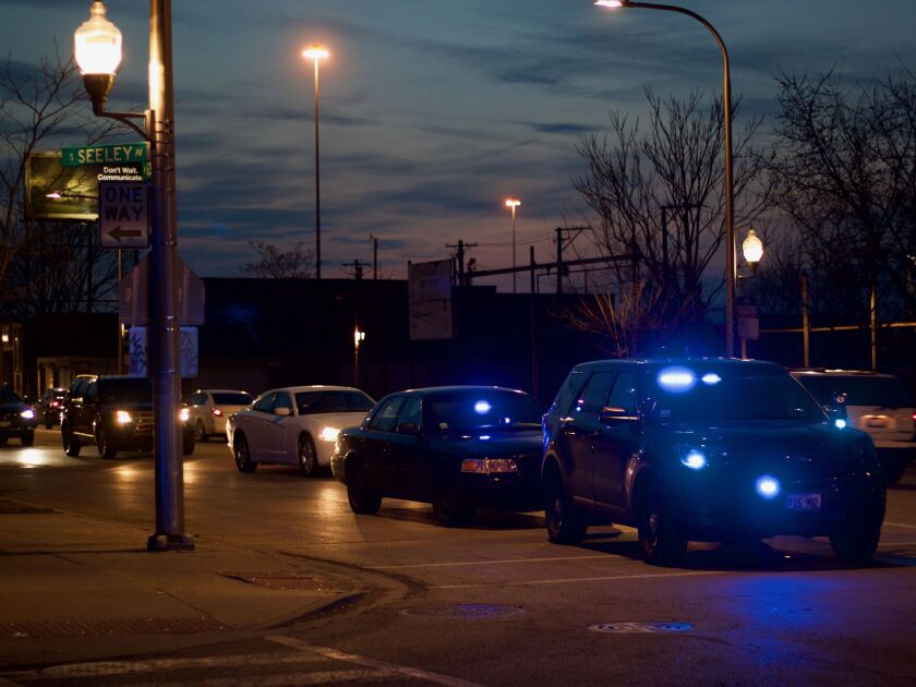 Police swarmed the scene of a shooting at 63rd and Seeley where at least six people were shot, including two children. | Matt Hendrickson/Sun-Times photo