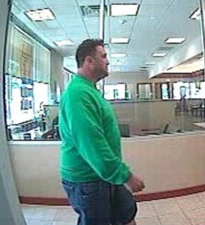 Surveillance photo of the man who robbed a bank Tuesday afternoon in the South Loop. | FBI photo