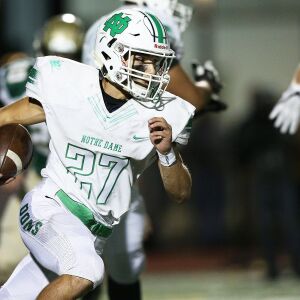 Notre Dame’s Julian Schurr (27) carries the ball. Allen Cunningham/For the Sun-Times.