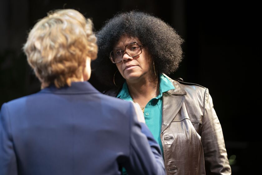 Marion Stamps (TaRon Patton, right) confronts Mayor Jane Byrne ( Christine Mary Dunford) in a scene from “Her Honor Jane Byrne” at Lookingglass Theatre.