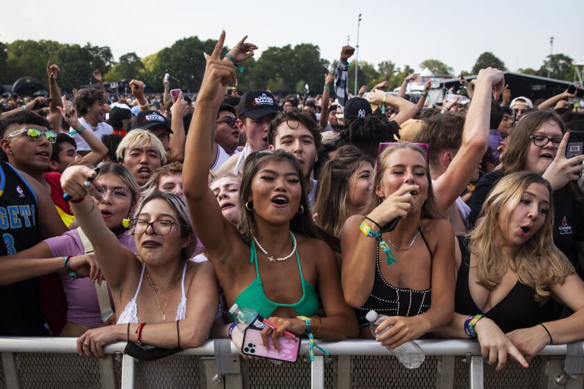 Festival-goers flock to Douglass Park on Friday afternoon for day one of the Lyrical Lemonade Summer Smash Festival on the Southwest Side.