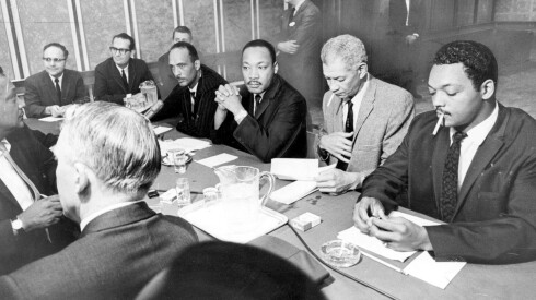 Jesse Jackson (far right) joins Raby, King, and Ed Berry at the Civil Rights Summit meeting in Chicago in 1966. |