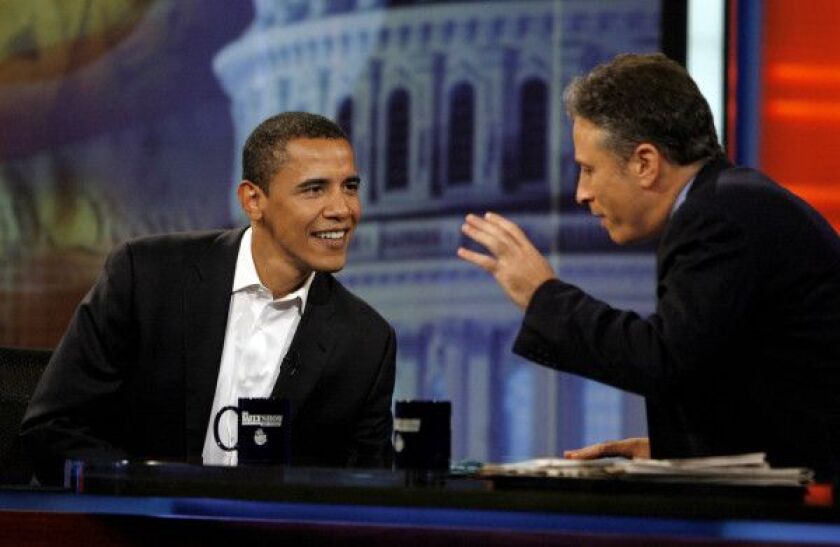 In this Aug. 22, 2007 file photo, Democratic presidential candidate U.S. Sen Barack Obama, D-Ill., talks with host Jon Stewart during an appearance on Comedy Central’s “The Daily Show with Jon Stewart” in New York. After more than 16 years and nearly 2,60