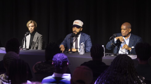 Students from Gwendolyn Brooks College Preparatory Academy High School listen as Chicago Board of Education presidential candidates Jessica Biggs, Hilario Dominguez and Victor Henderson participate in a forum hosted by WBEZ, Sun-Times and Chalkbeat on Oct. 14, 2026.