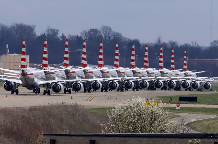 American Airlines planes sit idle on a closed taxiway at Pittsburgh International Airport on March 31.