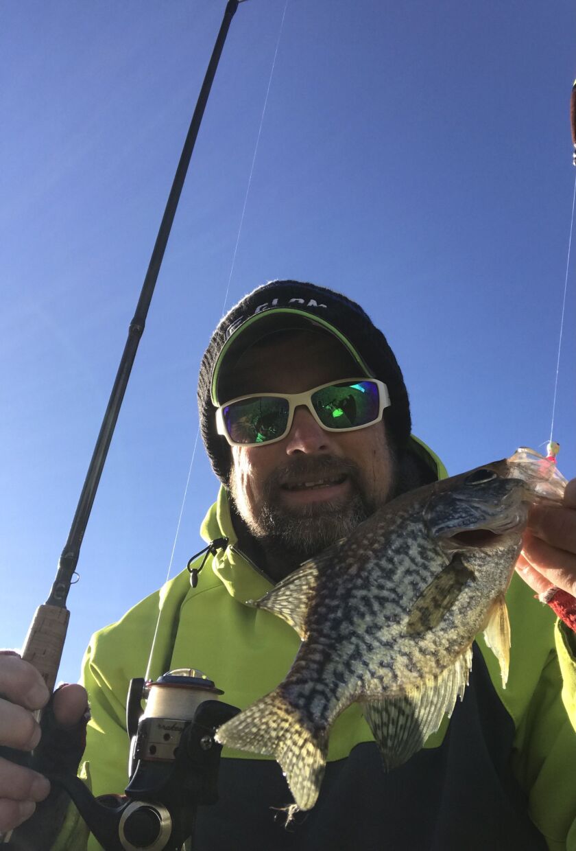 Ken “Husker” O’Malley holds a late fall crappie. Provided photo