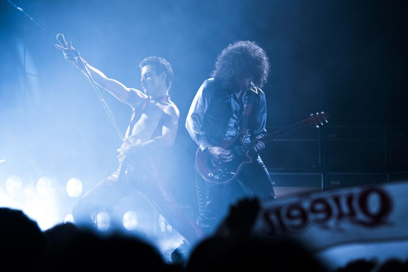 Rami Malek as Freddie Mercury (left) and Gwilym Lee (Brian May) in “Bohemian Rhapsody.” | TWENTIETH CENTURY FOX