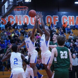Proviso East’s Keashon Fancher (15) and Aaron Skyes (5) both go up for a rebound against Lane, Wednesday 02-27-19. Worsom Robinson/For Sun-Times