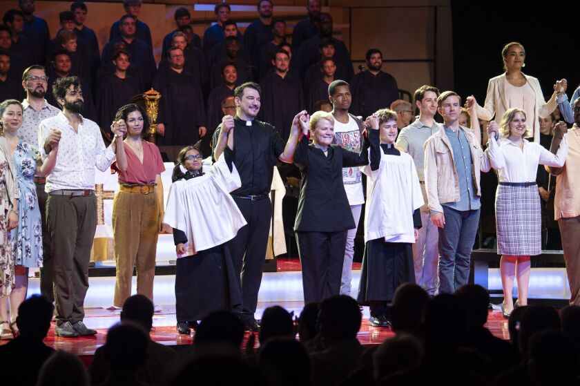 Conductor Marin Alsop (center) leads the curtain call following a performance of Bernstein’s Mass at Ravinia in 2018.