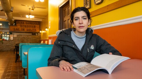 Author Ava Tomasula y Garcia sits in a booth inside Gordita’s Loli’s #3 located at 239 Pulaski Rd. in suburban Calumet City.