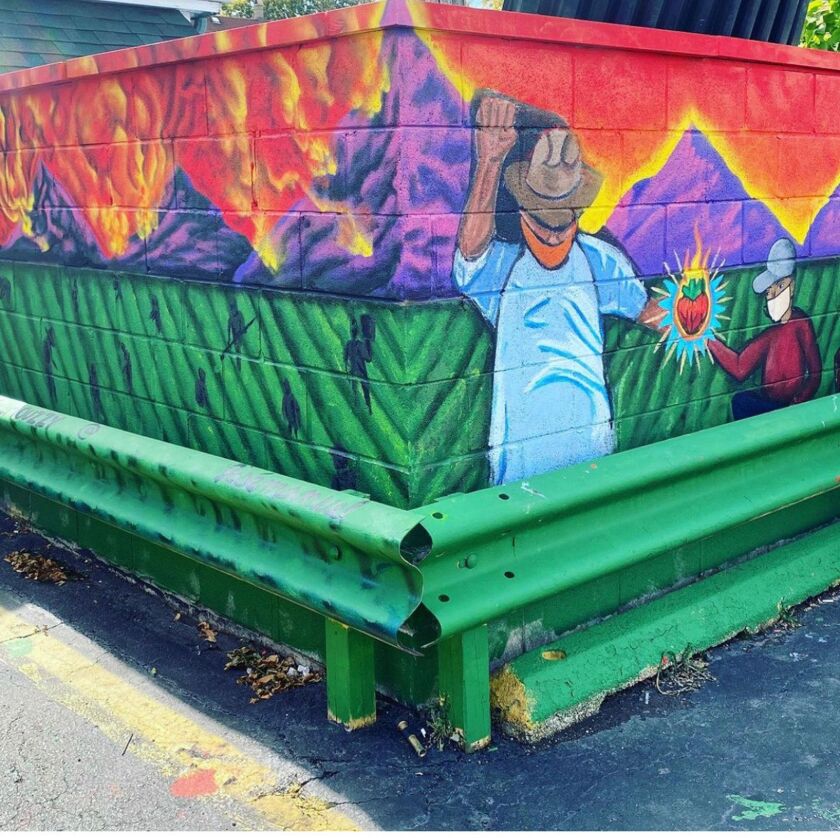 Gage Park Mural Project artists Artists Nancy Gutierrez, Josémanuel Hernandez and Mario Mena worked on this mural at 51st Street and California Avenue honoring Mexican farm workers.