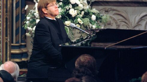  Elton John plays a specially re-written version of his song “Candle in the Wind” during the funeral service for Diana, Princess of Wales, at London’s Westminster Abbey in this Saturday, Sept. 6, 1997 file photo.