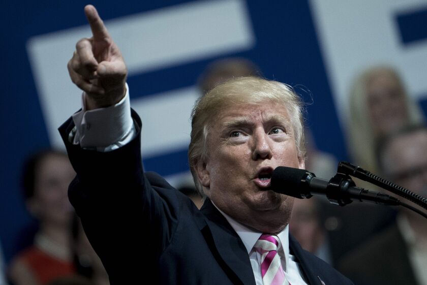 President Donald Trump is shown at a rally last week in Huntsville, Alabama, where he decried activist National Football League stars as “sons of bitches” who should be fired for kneeling or sitting during the national anthem. | Brendan Smialowski/AFP/Get