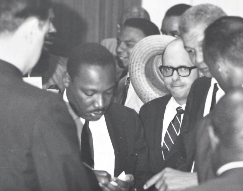 Rev. Martin Luther King Jr. and Rabbi Robert J. Marx (in glasses) at Soldier Field in 1966.