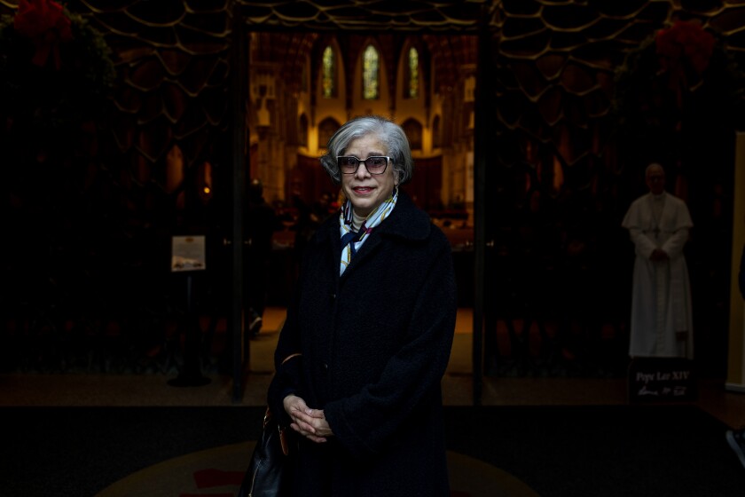 Sharon Long stands for a portrait inside of the front entrance at Holy Name Cathedral on Sunday December 28, 2025.