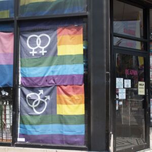 Rainbow Pride flags in the window of Beatnix on Halsted Street in Boystown. | Colin Boyle/Sun-Times