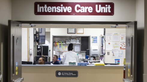 Health care workers at the nurse’s station in the Intensive Care Unit at Roseland Community Hospital.