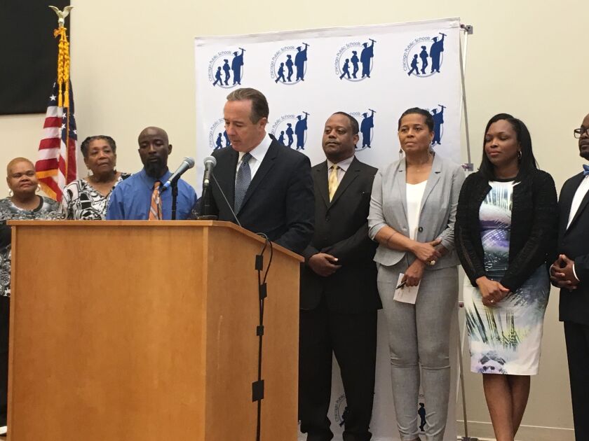Then-Chicago Public Schools CEO Forrest Claypool and other officials announcing plans for a new high school in Englewood and closing the South Side neighborhood’s existing four high schools. Dori Collins, co-chair of CPS’ Englewood Community Action Counci