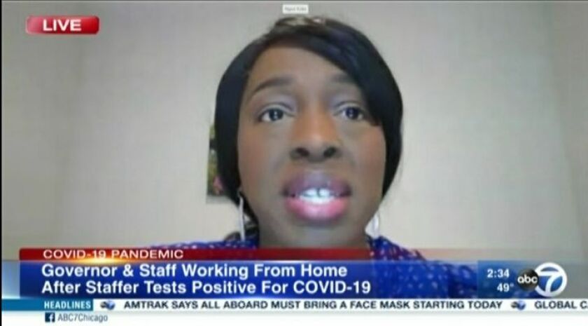 Dr. Ngozi Ezike, director of the Illinois Public Health Department, speaks during the daily briefing Monday.