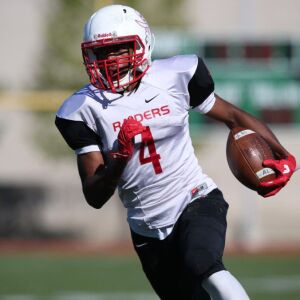 Raby’s Varren King carries the ball. Allen Cunningham/For the Sun-Times.