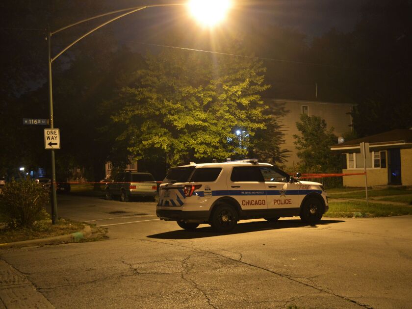 Police investigate a shooting about 11:30 p.m. Saturday, August 18, 2018 in the 11600 block of South Yale Avenue in Chicago. | Justin Jackson/ Sun-Times