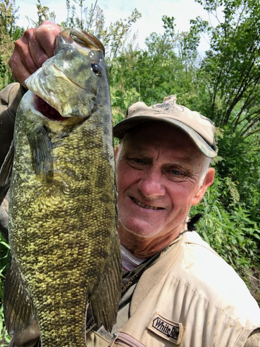 George Peters with his smallmouth bass of the year from the Kankakee River. Provided photo