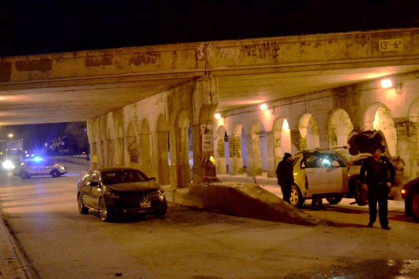 The scene of a crash late Wednesday near the intersection of Cicero and Foster avenues that left a man injured. Justin Jackson/Chicago Sun-Times