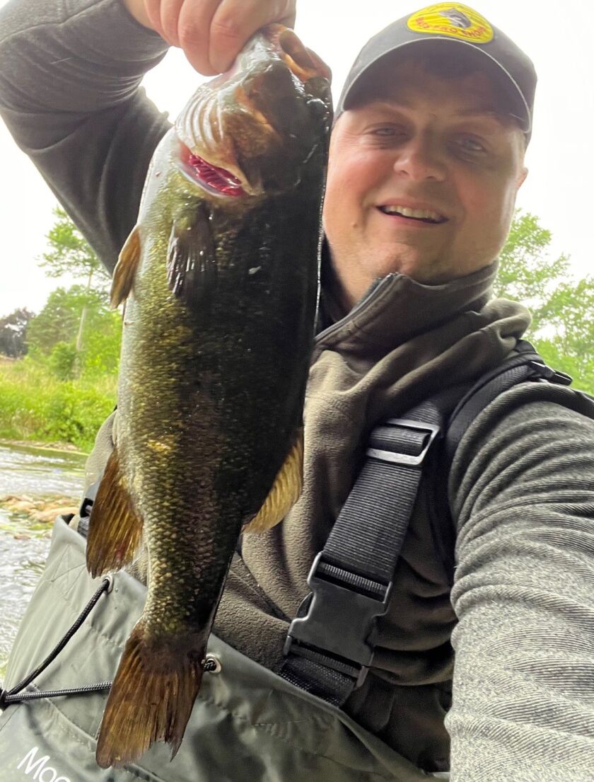 Aaron Funke with a good smallmouth bass from the DuPage River. Provided photo