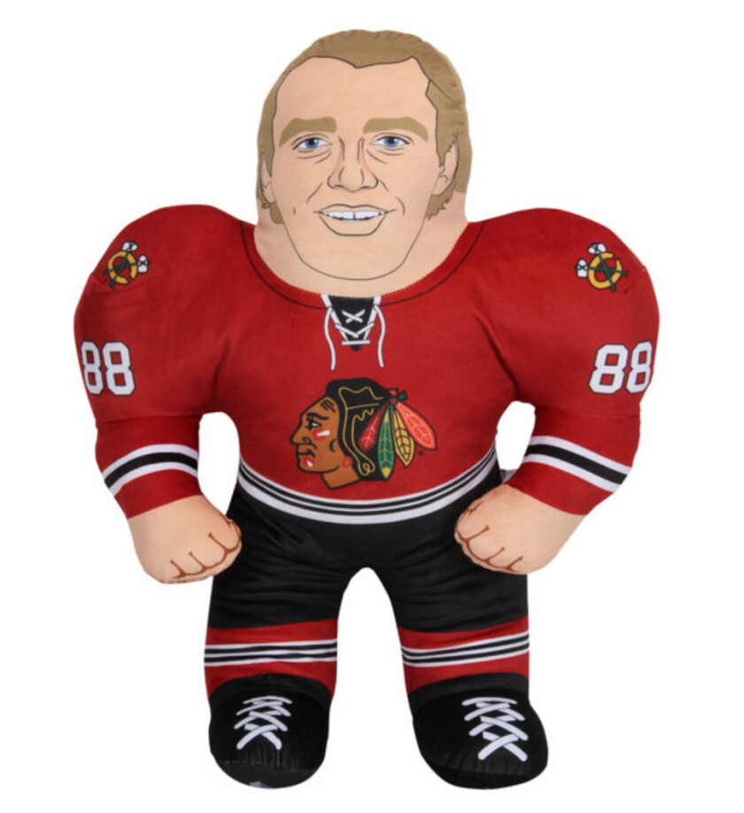Not sure if you want to cuddle up with this terrifying plush pillow. | Courtesy of NHL Shop