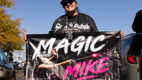 White Sox fan Nikki Tieman holds a banner in support of pitcher Mike Vasil while tailgating outside Rate Field in Bridgeport on the South Side, Tuesday, Oct. 6, 2026. | Candace Dane Chambers/Sun-Times.