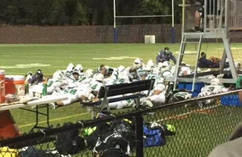 Providence players duck for cover during Friday’s game against Hope Academy at Altgeld Park. (photo from Facebook)