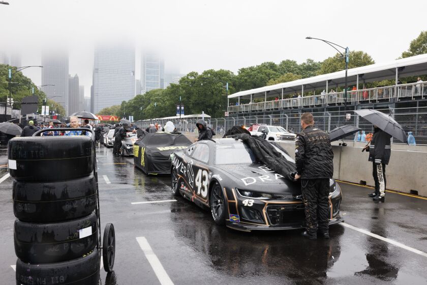 Team of NASCAR driver Noah Gragson unveils his vehicle to being race prep prior to the Grant Park 220 NASCAR Street Race, Sunday, July 2, 2023.