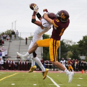 Montini’s Scott West (1) intercepts a pass. Allen Cunningham/For the Sun-Times.
