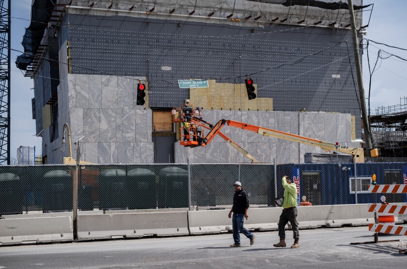 Obama Center gets fancy new granite cladding on tower - Chicago Sun-Times