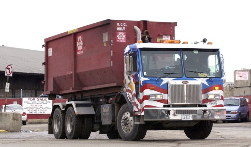 A truck for D & P Construction, a waste-hauling company that the FBI has said was controlled by brothers John DiFronzo and Peter DiFronzo.