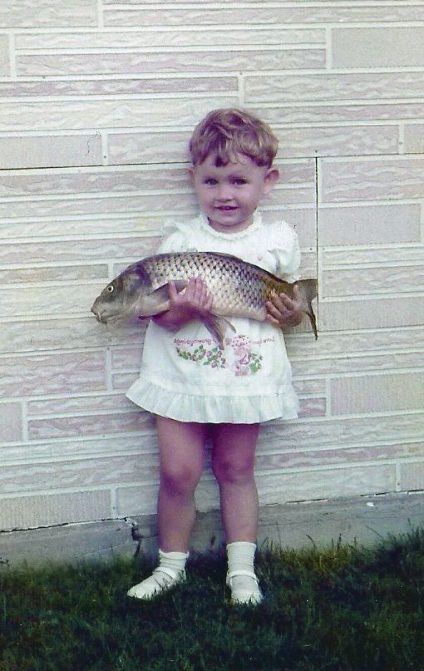 Violetta Talley, as a 3-year-old with her first fish.<br>Credit: For the Sun-Times