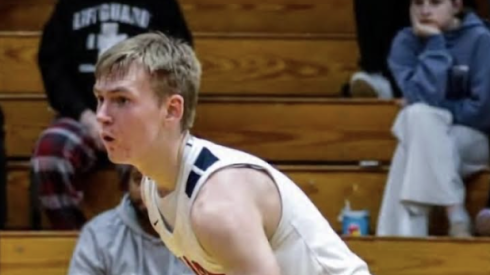Glenbard East senior Danny Snyder dribbles the ball last season.