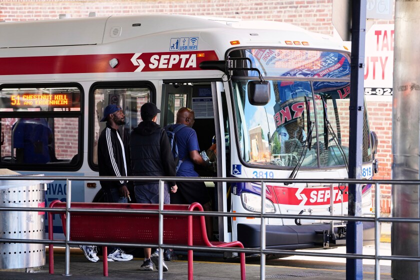 Passengers board a Southeastern Pennsylvania Transportation Authority (SEPTA) bus in Philadelphia, Monday, Aug. 25, 2025.