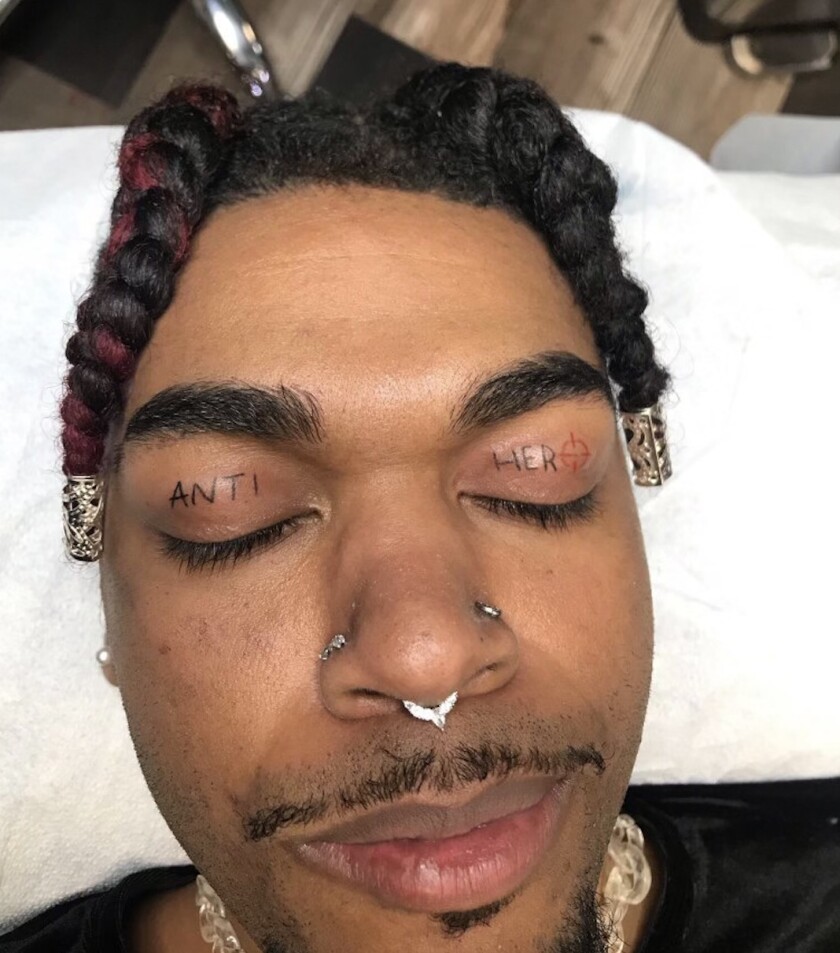 Chicago tattoo artist Stephen Lavallee inked Nico Roberts’ eyelids with the words “Anti Hero.”