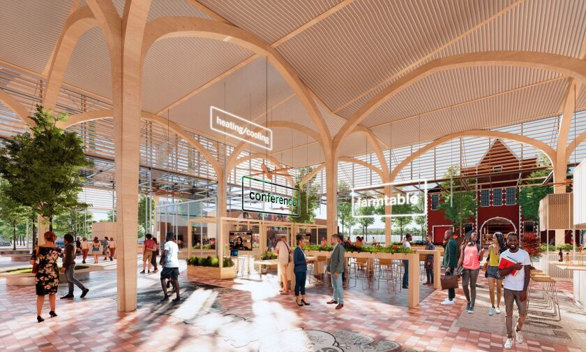 A rendering of part of a commercial development in Englewood, with the community’s former firehouse shown in the background.
